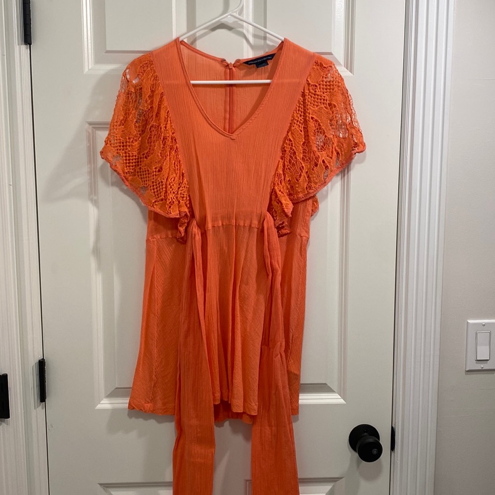 French Connection belted cover up. Worn once. More coral than photo is showing.